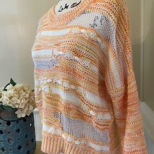 Light orange colored multicolor sweater
